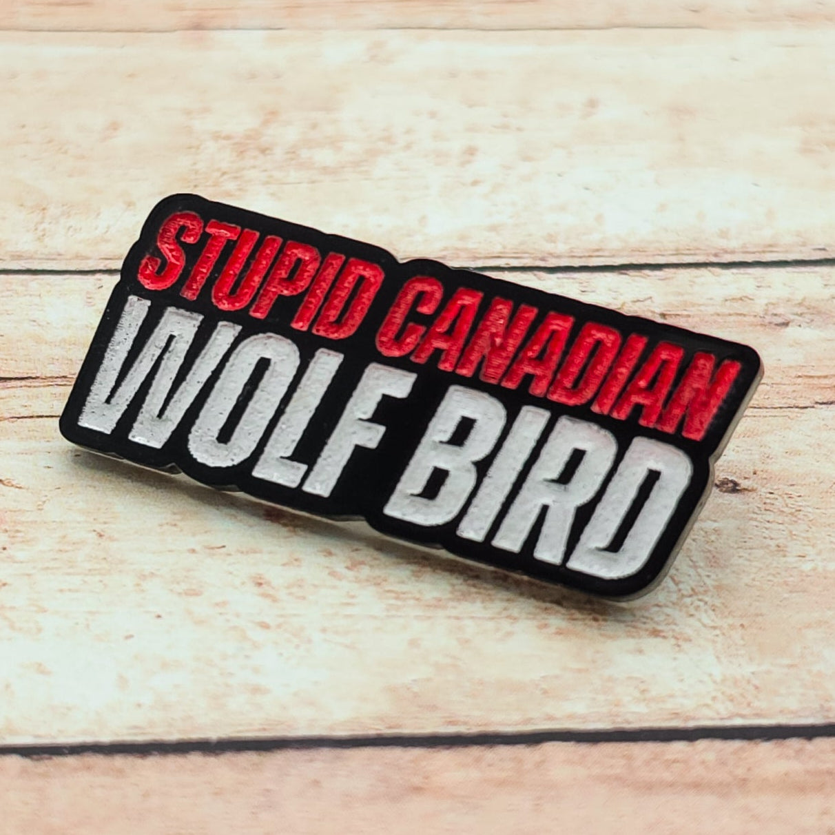 Heated Rivalry Inspired “Stupid Canadian Wolf Bird" Lapel Pin