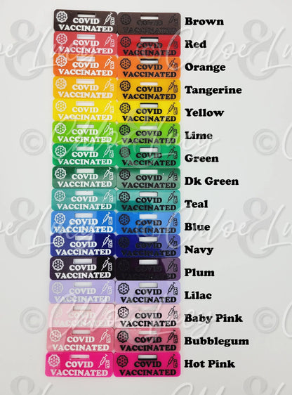 Colorful COVID vaccinated bag tags in assorted shades, labeled by color name.